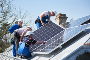 installing-solar-photovoltaic-panel-system-on-roof-2022-05-16-16-05-15-utc